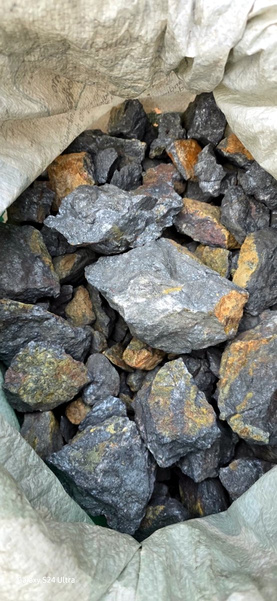 Bagged raw antimony ore ready for staging
